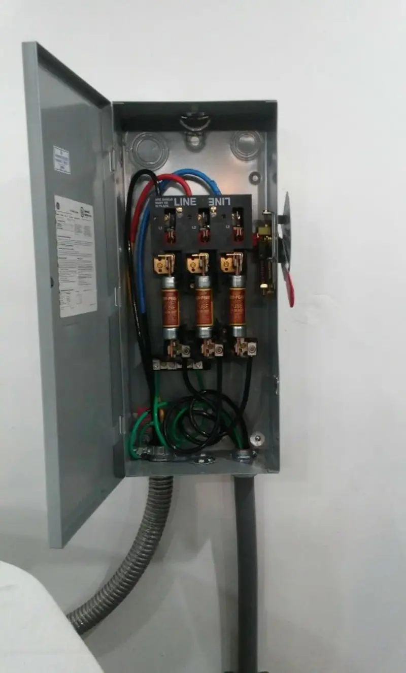 Three-phase disconnect switch installed for Smoke Detector Installation in Genesee